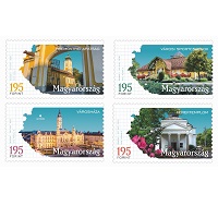A képen a Tájak, városok bélyegsorozatának Balatonfüred, Csorna és Nagyatádot felvillantó bélyeg képe látható.